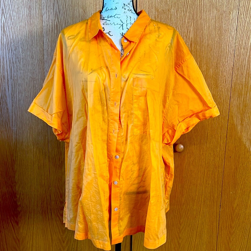 Bright orange top